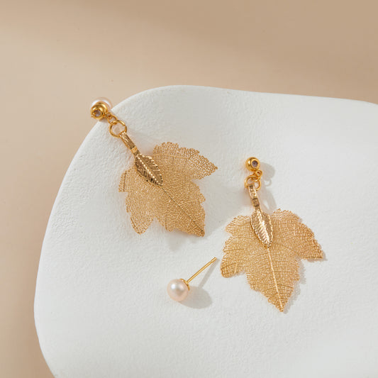 Peal studs with maple leaf jacket