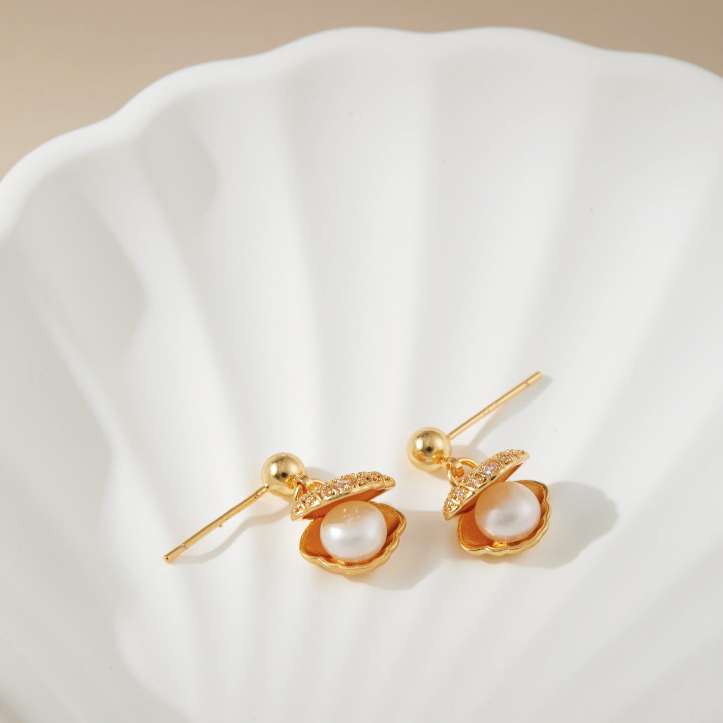 Pearl in the shell earrings