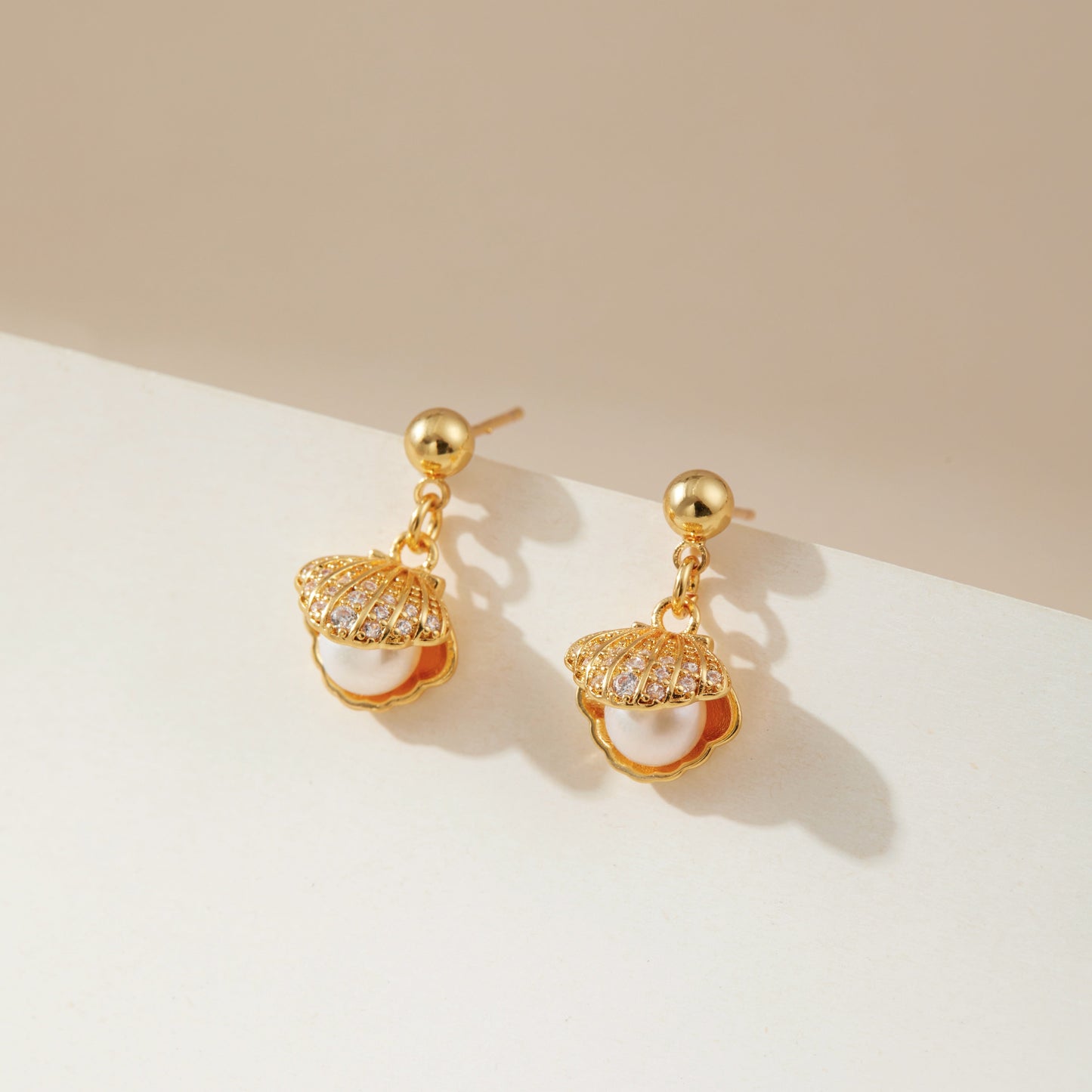 Pearl in the shell earrings