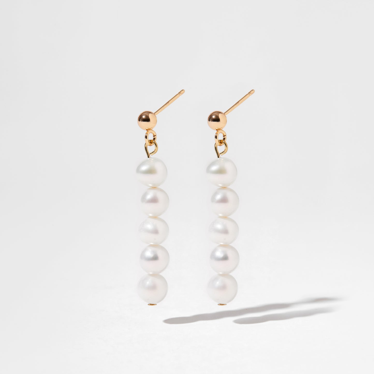 Five pearls earrings