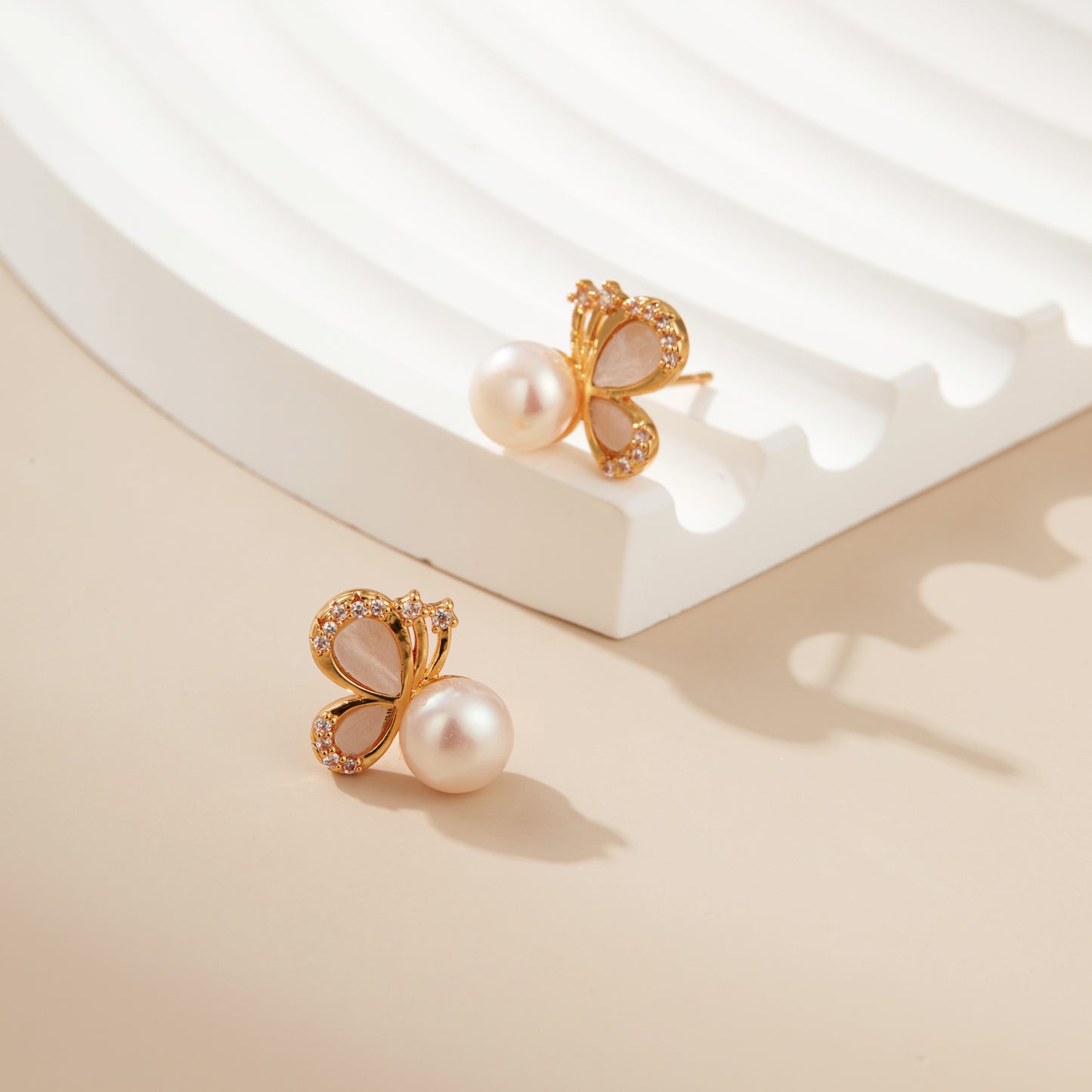 Shimmering Pearl Butterfly Studs.