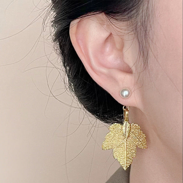 Peal studs with maple leaf jacket