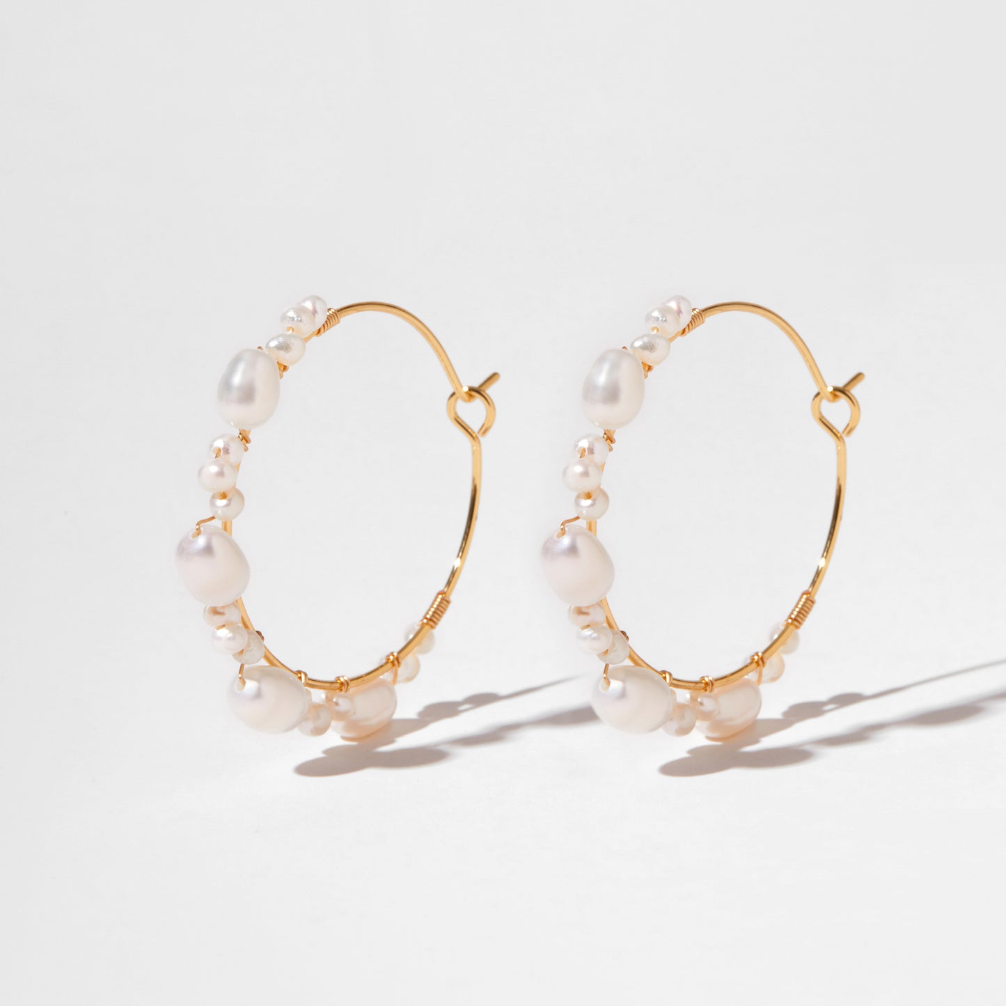 Winding Baroque Star Pearl Hoops