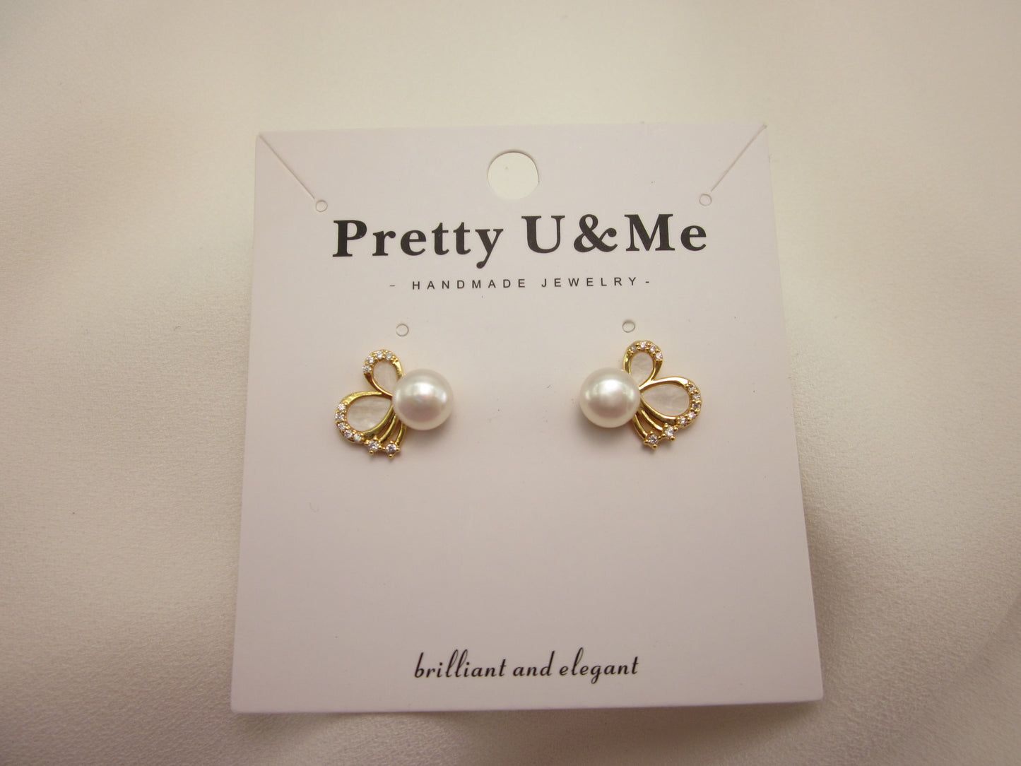 Shimmering Pearl Butterfly Studs.